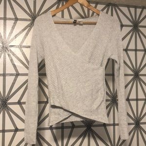 Deep v neck crossover sweater